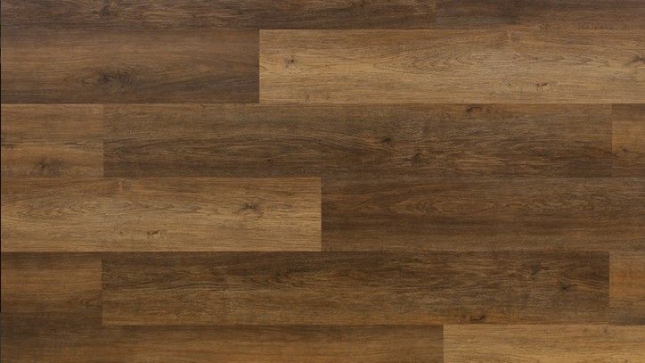 A close up of a wooden floor with a wood grain texture.