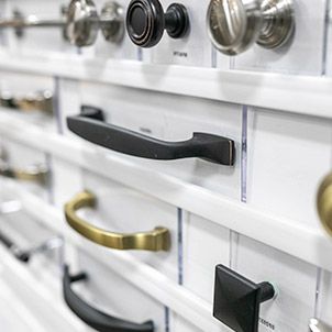 There are many different types of handles and knobs on display.
