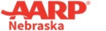 A red logo for aarp nebraska on a white background