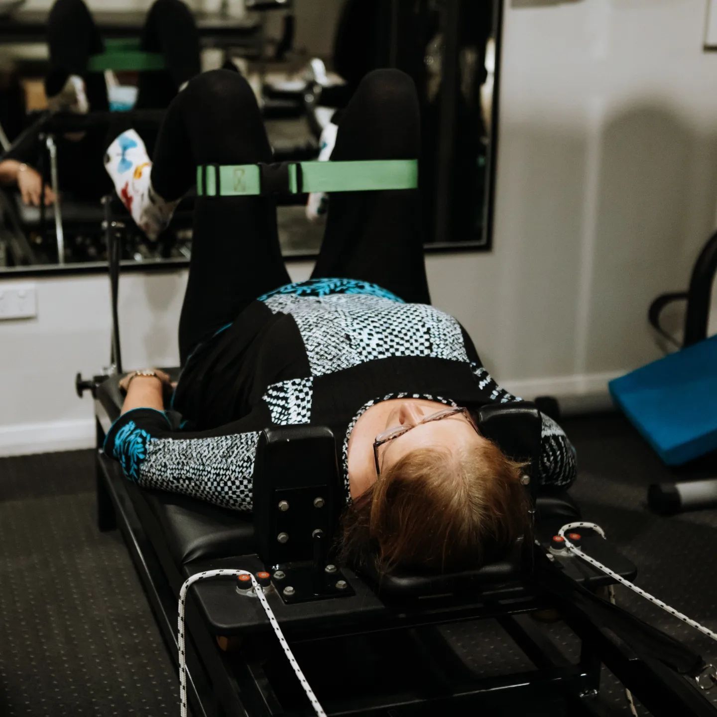 Person Exercising on a Pilates Machine — Forerunner Physio In Taree, NSW