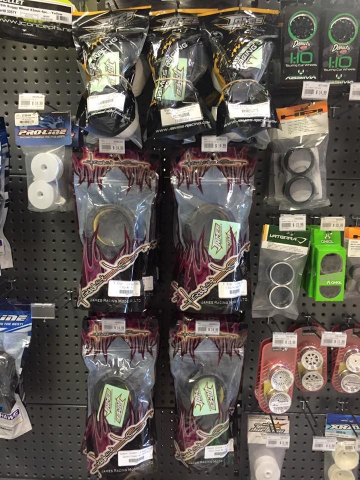 Shelves Stocked With Various RC Car Parts, Packaged In Clear Plastic — Midtown Hobbies In Lismore, NSW