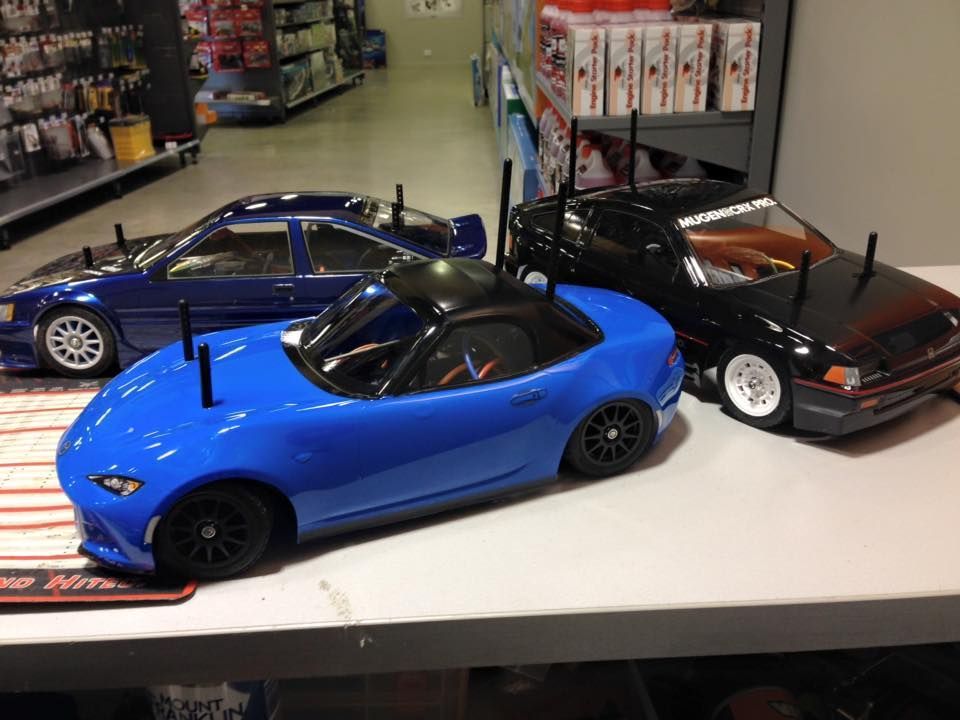 Blue Convertible, Dark Blue Sedan, And Black Coupe RC Cars — Midtown Hobbies In Lismore, NSW