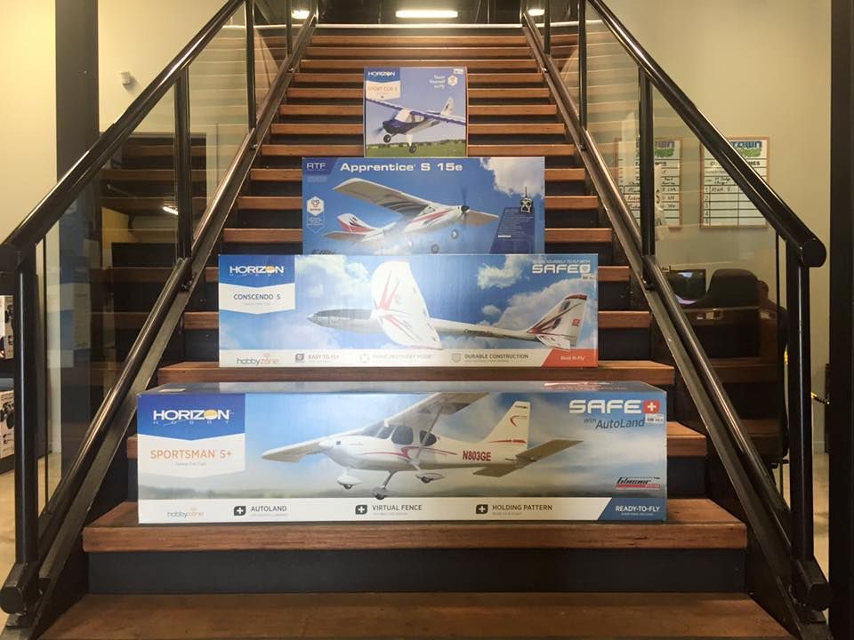 Four Airplane Model Boxes Displayed On A Staircase In A Store — Midtown Hobbies In Lismore, NSW