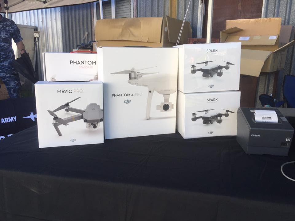 Boxes of DJI Drones, Including Phantom 4 And Mavic Pro, On A Table — Midtown Hobbies In Lismore, NSW
