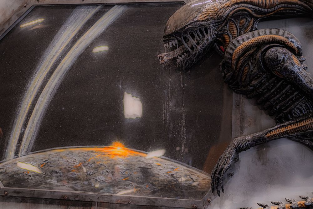 An Alien Creature Sculpture Next To A Futuristic Window — Midtown Hobbies In Lismore, NSW