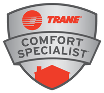 Trane Comfort Specialist badge, silver shield shape, red house icon, Trane logo in red, gray border.
