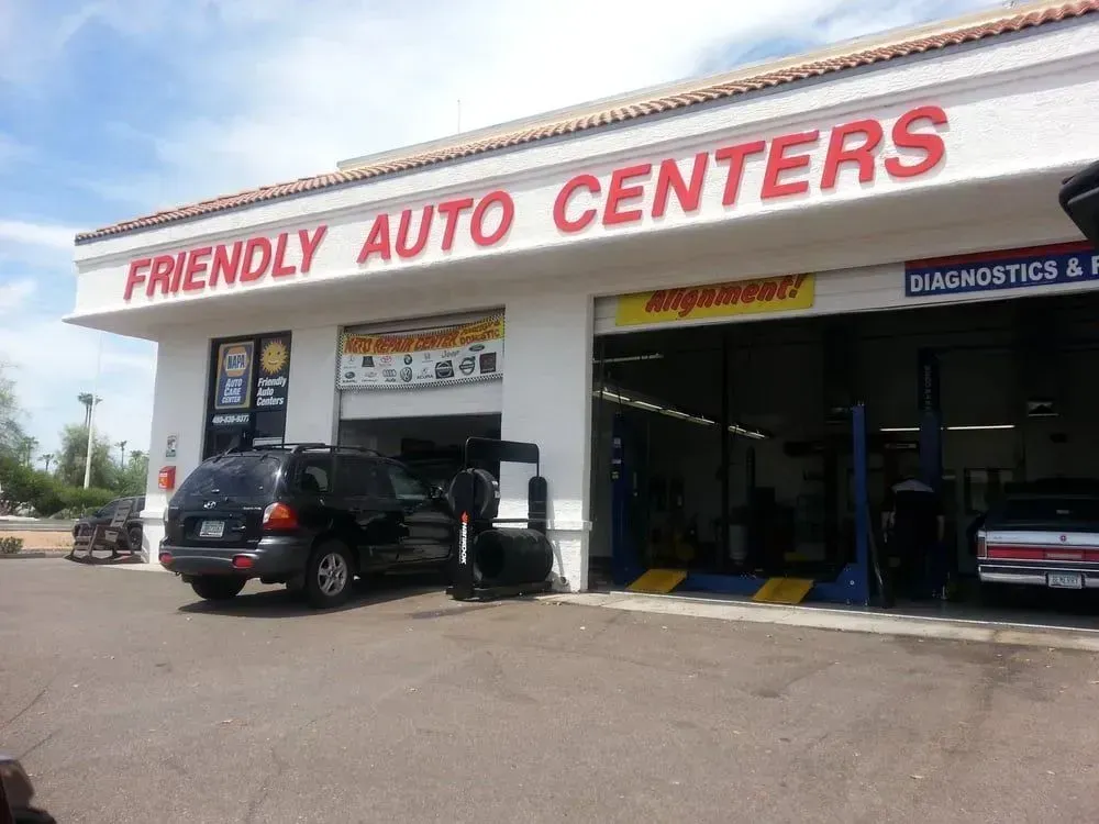 A car is parked in front of a friendly auto center | Friendly Auto Centers