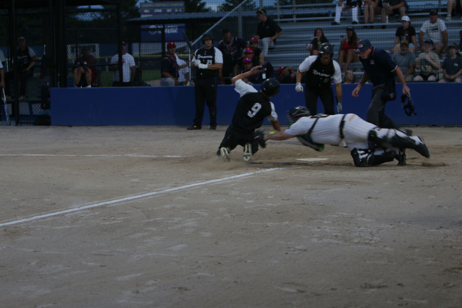 Brent Meshke Ostrander Norsemen is tagged out by Aaron Waugh Sebringville Sting at the plate
