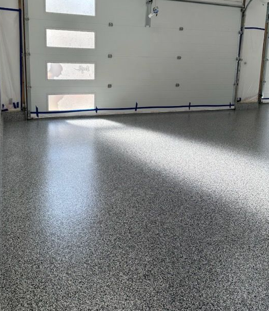 Full Broadcast Flake Epoxy Garage Floor Installation