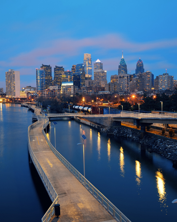 A modern house with a swimming pool and a lot of windows.