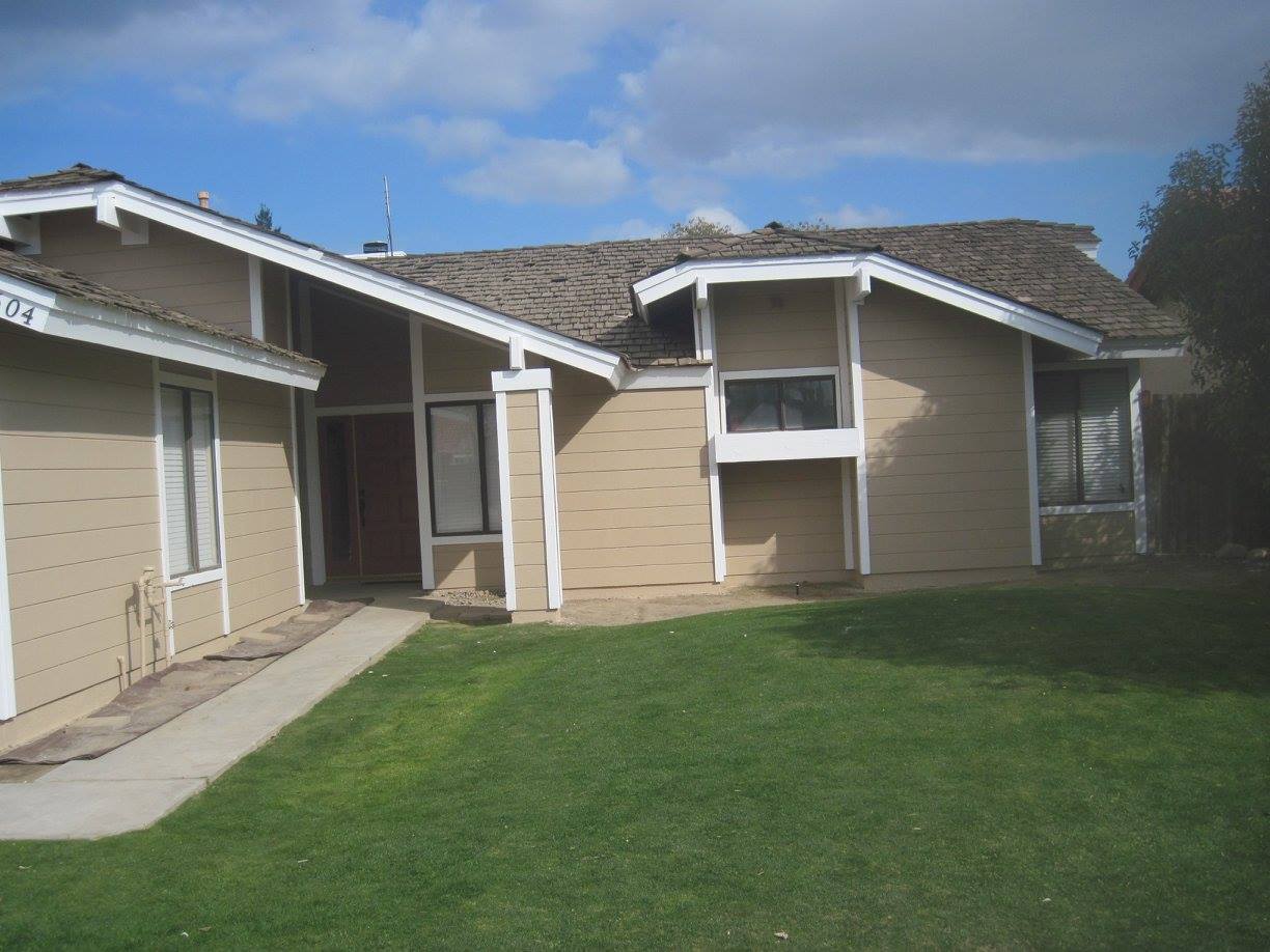 A house with the number 37 on the side of it