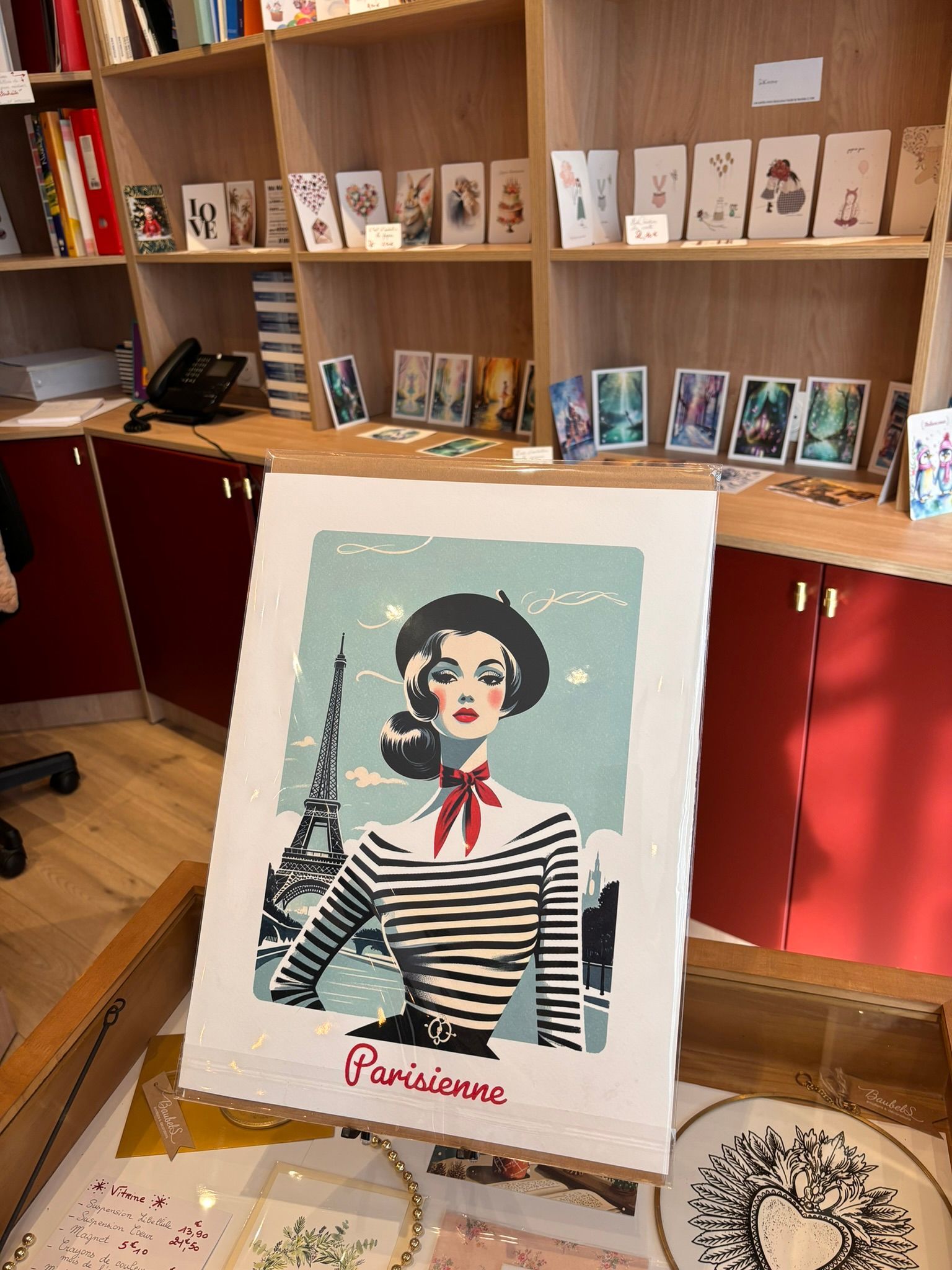 image de la parisienne, affiche crée par la papeterie