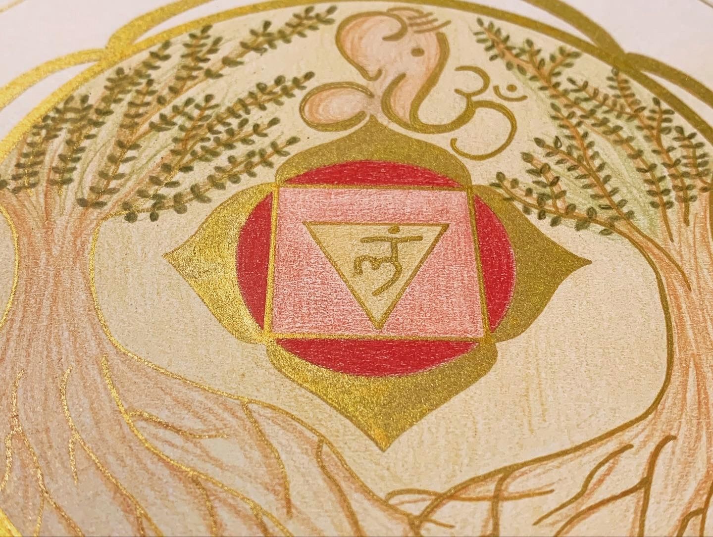 Illustration of a red and gold Muladhara chakra symbol, with the Hindu deity Ganesha and trees.