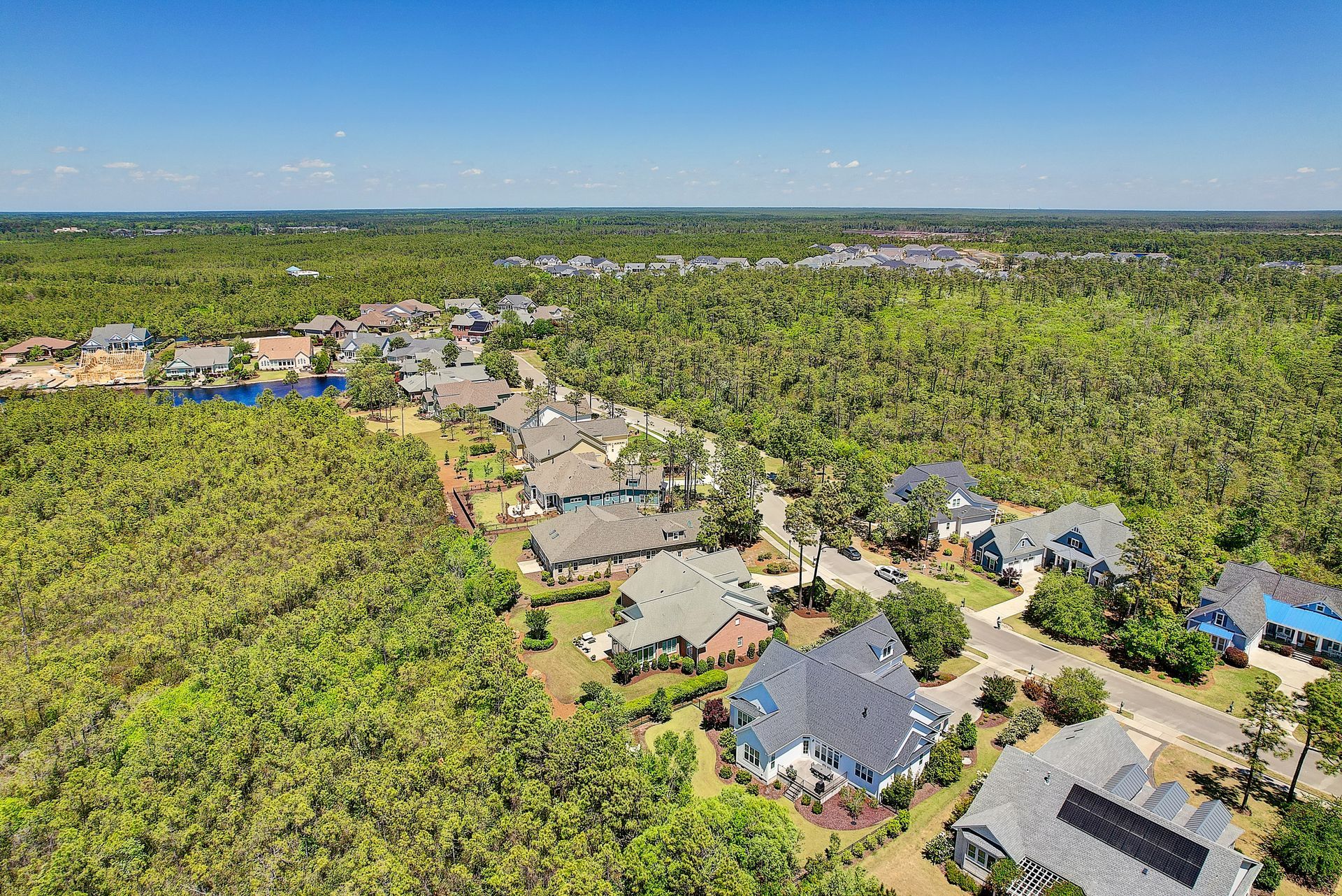 Aerial View of a Residential Area surrounded by Trees| Find houses for sale and buy a home in St. James with Thomas McCloskey