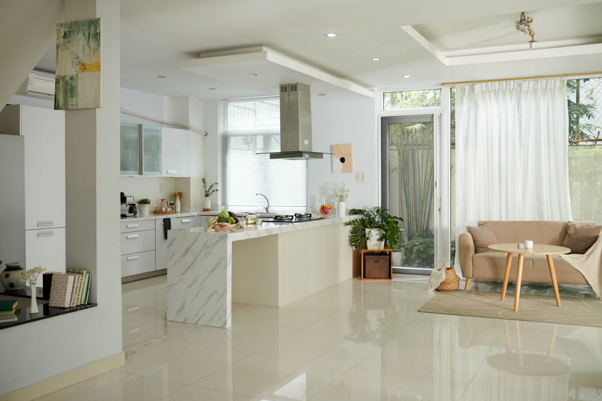 Beautiful open White Kitchen with a view of the couch | Thomas McCloskey, top realtor and listing agent in St. James