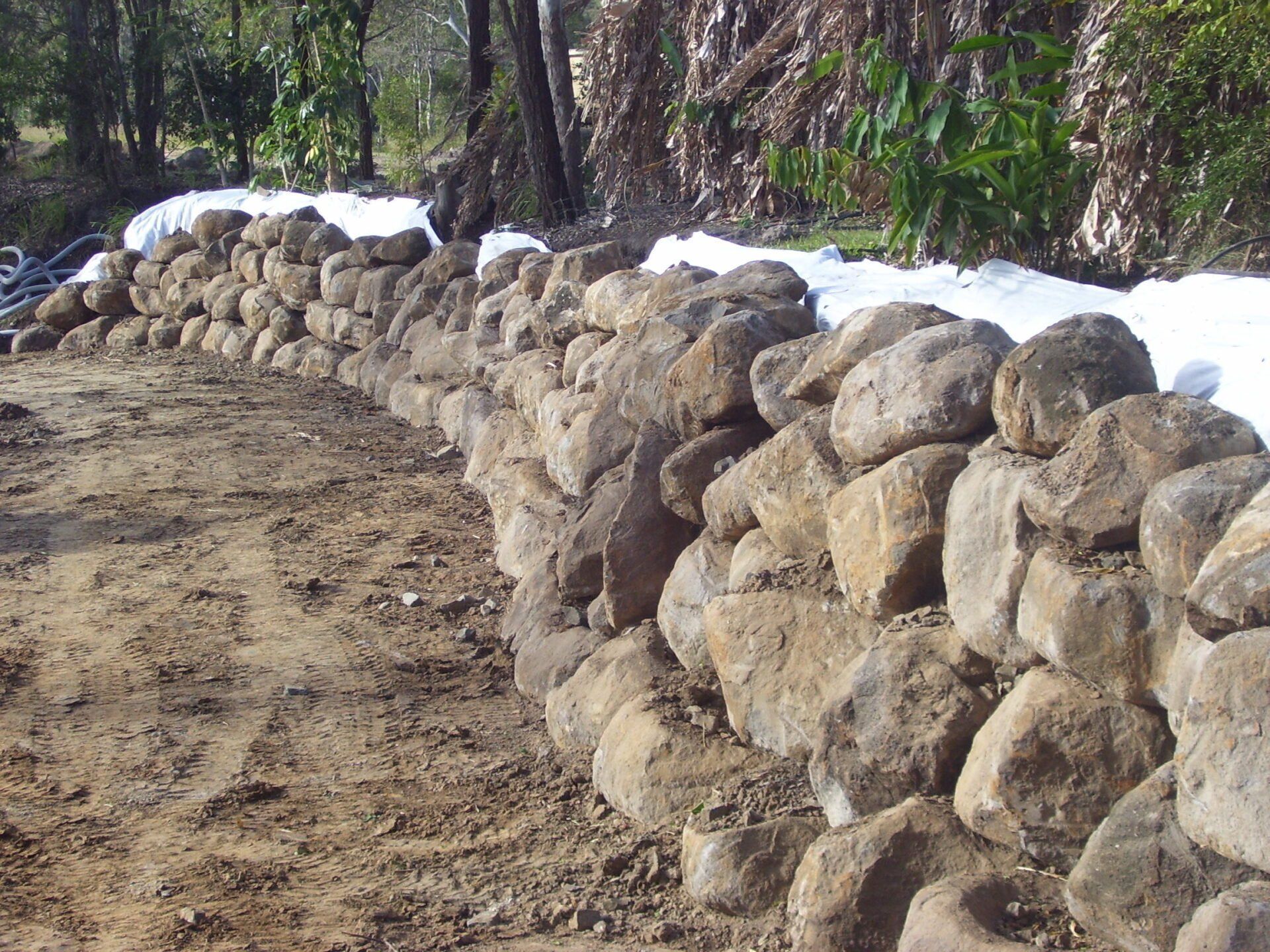 Large Rock Wall in Progress 3 — A1 Rock This City Truck & Dog Hire In Good Night QLD