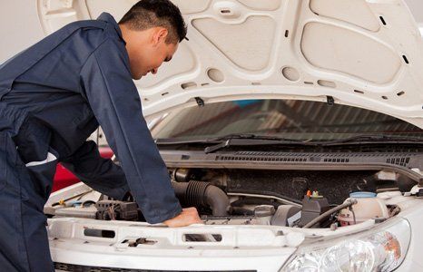 car mechanic in blue uniform