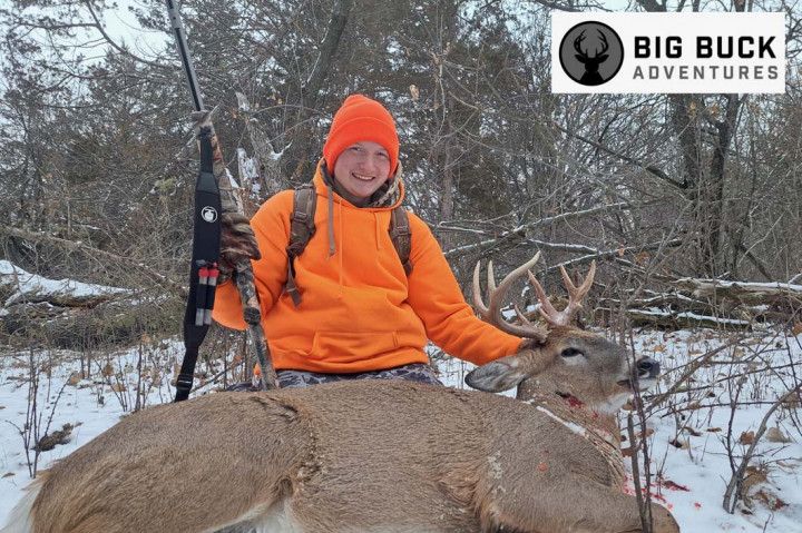 Man Holding A Deer