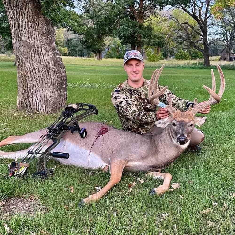 Man And A Lifeless Deer