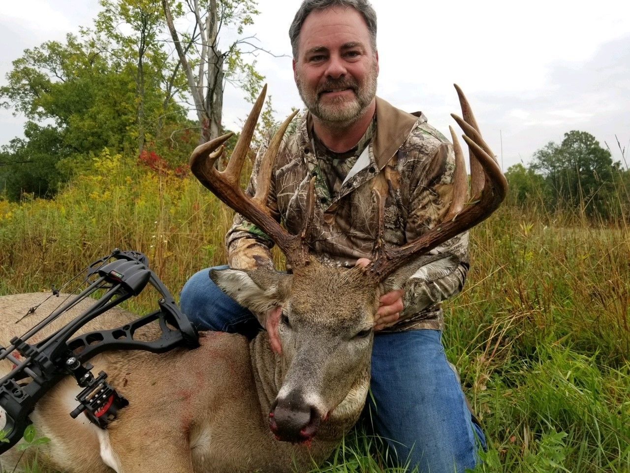 Man With A Large Deer
