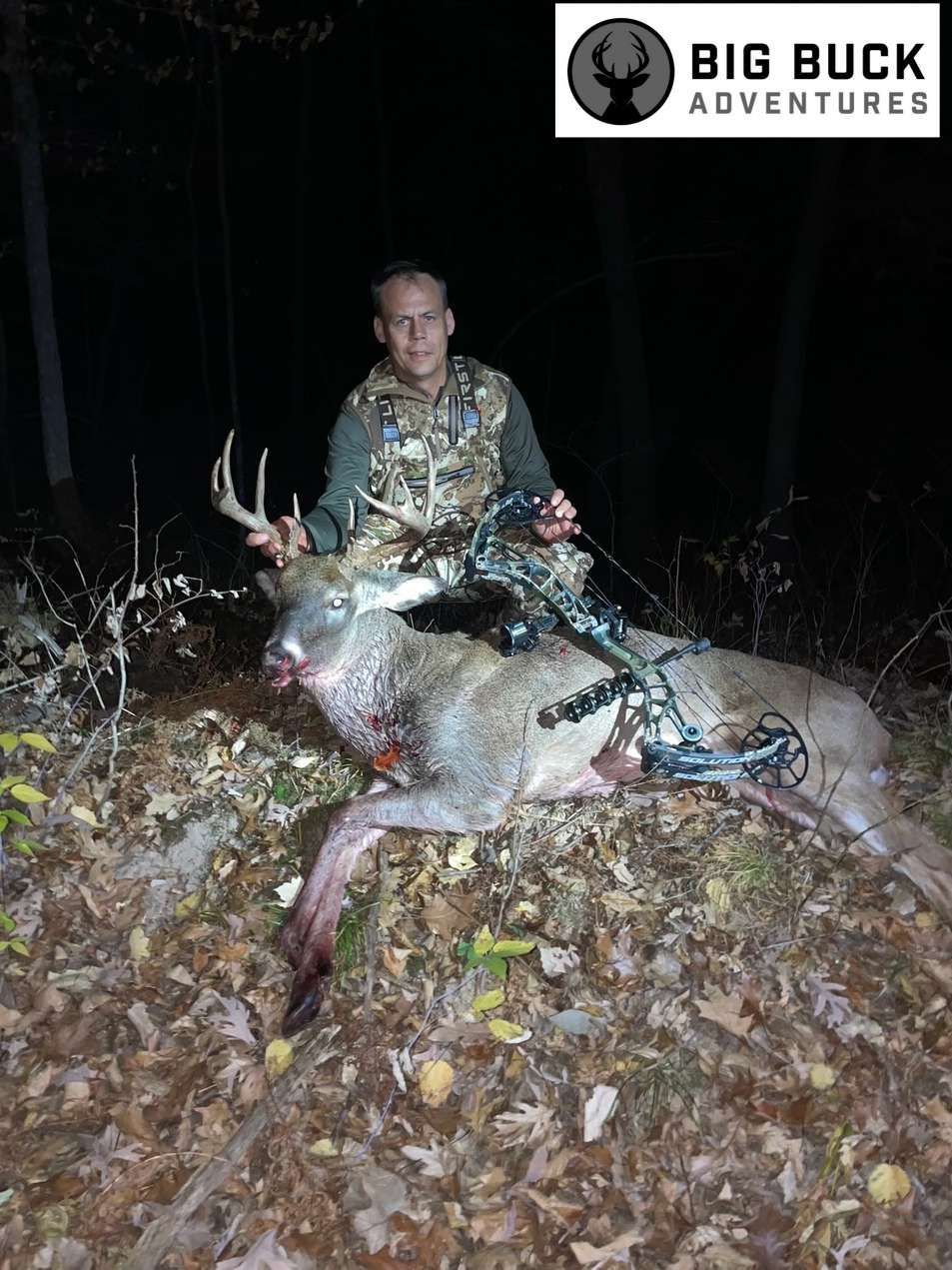 Hunter wearing camouflage clothes with rifle in hand