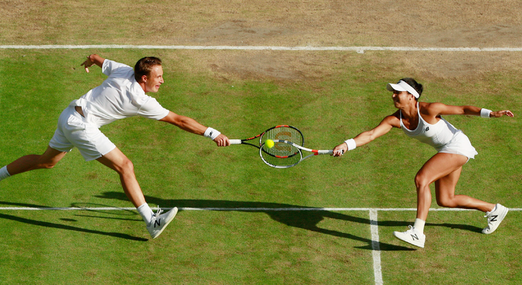 A tennis team trying to coordinate their play