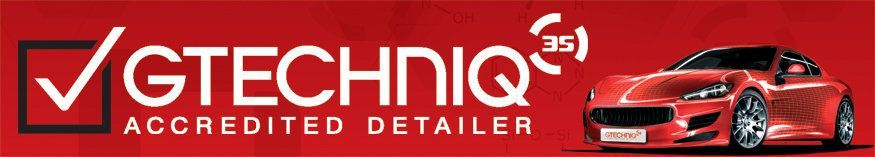 A logo for gtechniq accredited detailer with a red car in the background