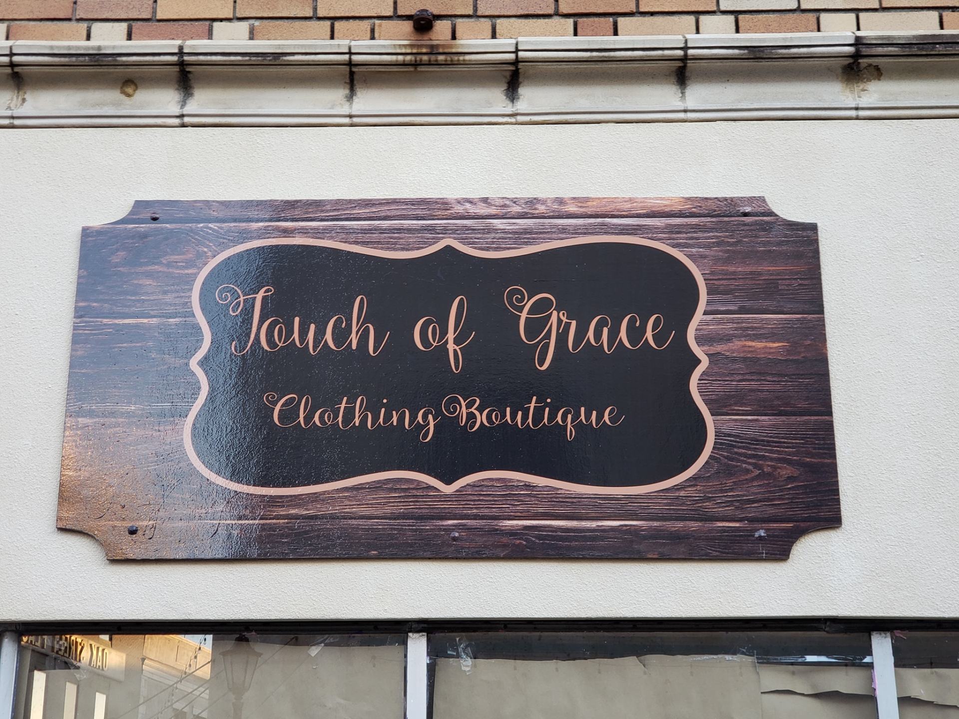 Touch of Grace Clothing Boutique sign