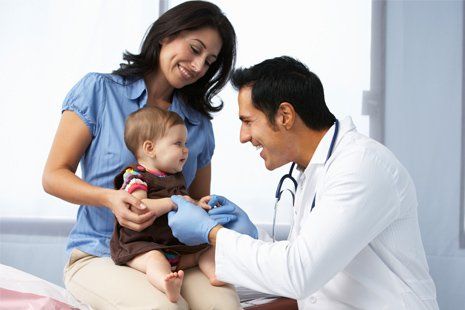 Pediatrician — Pediatrician Checking Child Heartbeat in Panama City, FL