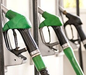 A Row of Gas Pumps Are Lined Up in a Gas Station — Mechanical Repairs In Gympie, QLD