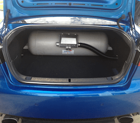 The Trunk of a Blue Car With a Gas Tank in It — Mechanical Repairs In Gympie, QLD