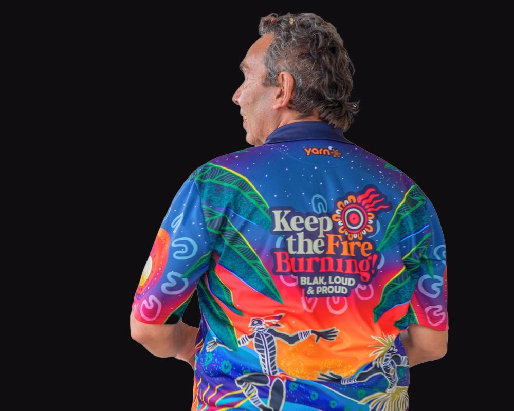 Man wearing a colorful shirt with 