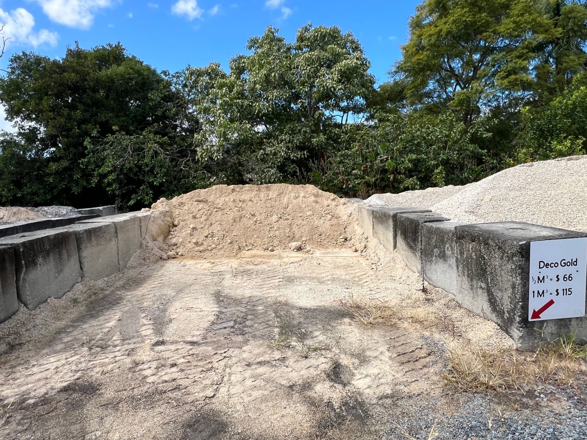 A sand-filled bin enclosed by concrete blocks — Laurieton Landscape Supplies In Harrington, NSW