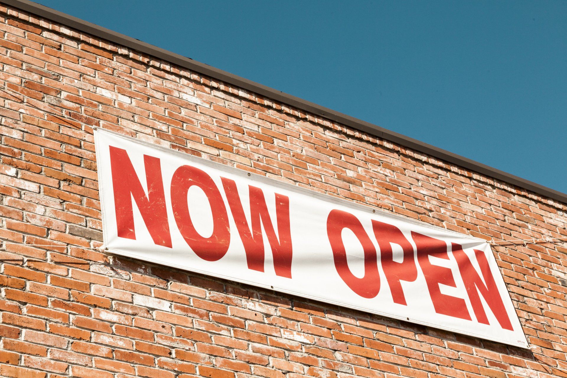 NOW OPEN Banner in the Wall - Oxnard, CA - Vargas Signs