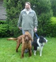 Dog staff with two dogs - Columbus, OH - Oakland Park Animal Hospital