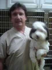 A man with a dog - Columbus, OH - Oakland Park Animal Hospital