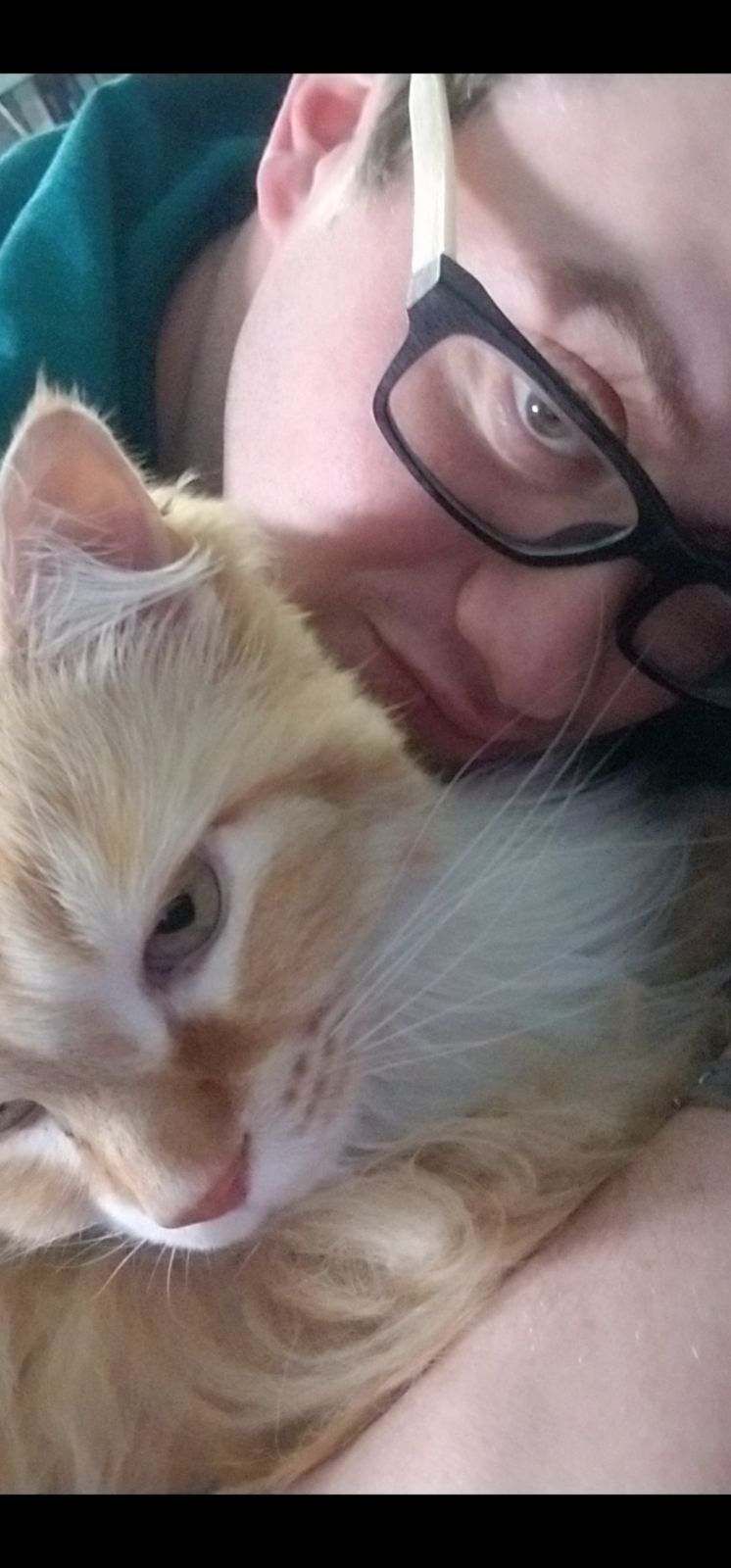 Holding A Cat In Her Arms — Columbus, OH — Oakland Park Animal Hospital