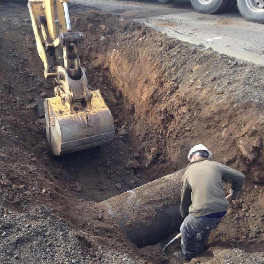 Worker and Excavator Machine — Orchards, WA — Tilton Excavation