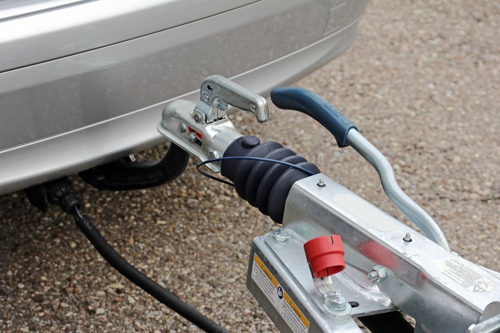 Trailer Hitch Connected to a Silver Car — Best Price Towing in Muswellbrook, NSW