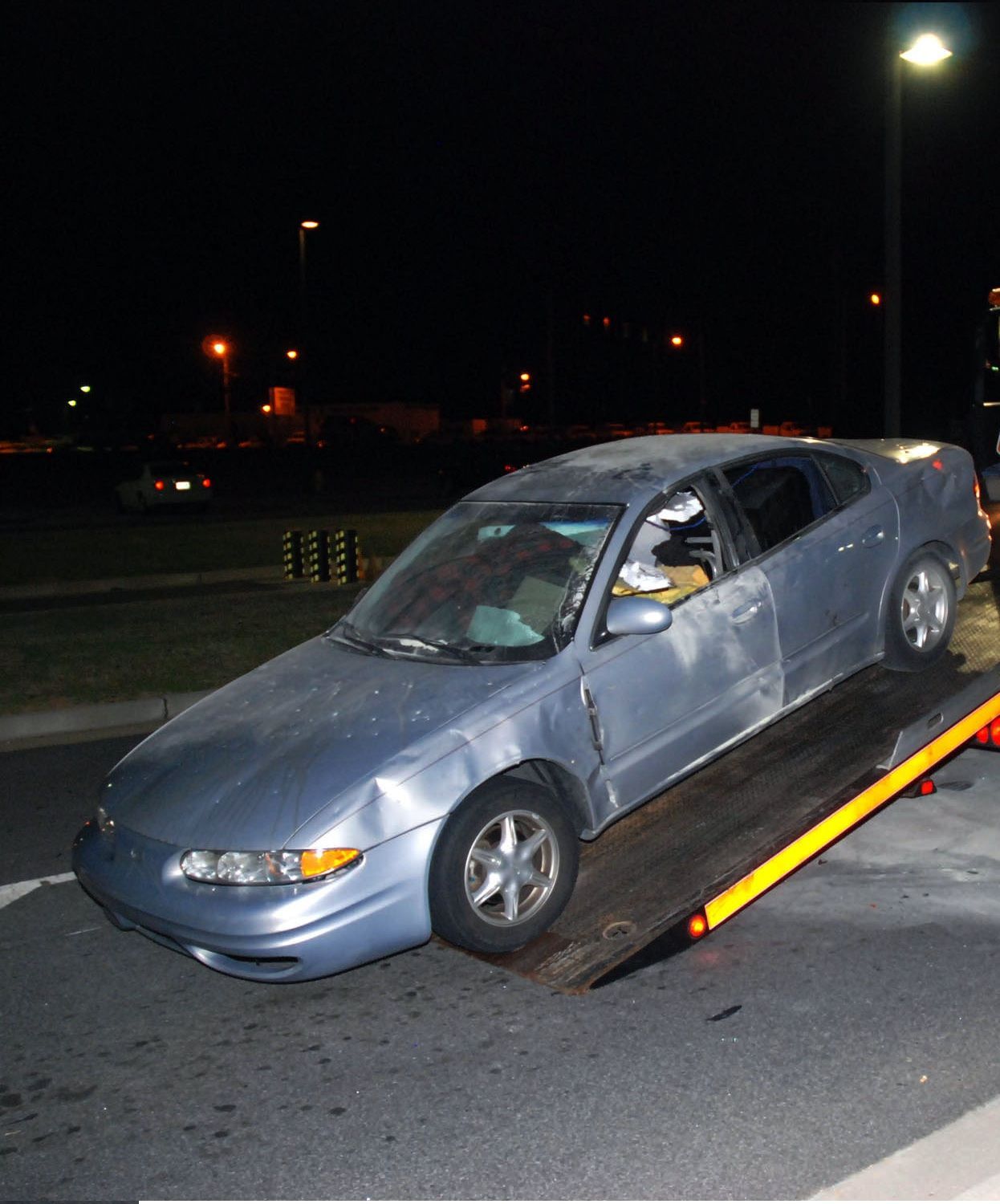 Blue Car, Damaged on Side — Best Price Towing in Newcastle, NSW