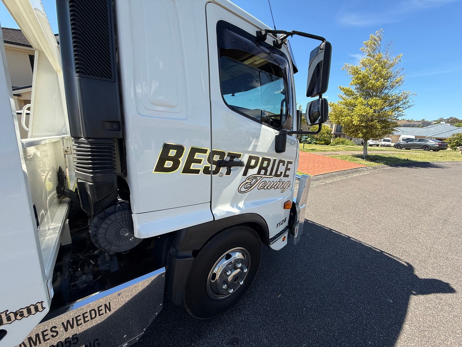 A side view of Best Price Towing truck — Best Price Towing in Woongarrah, NSW