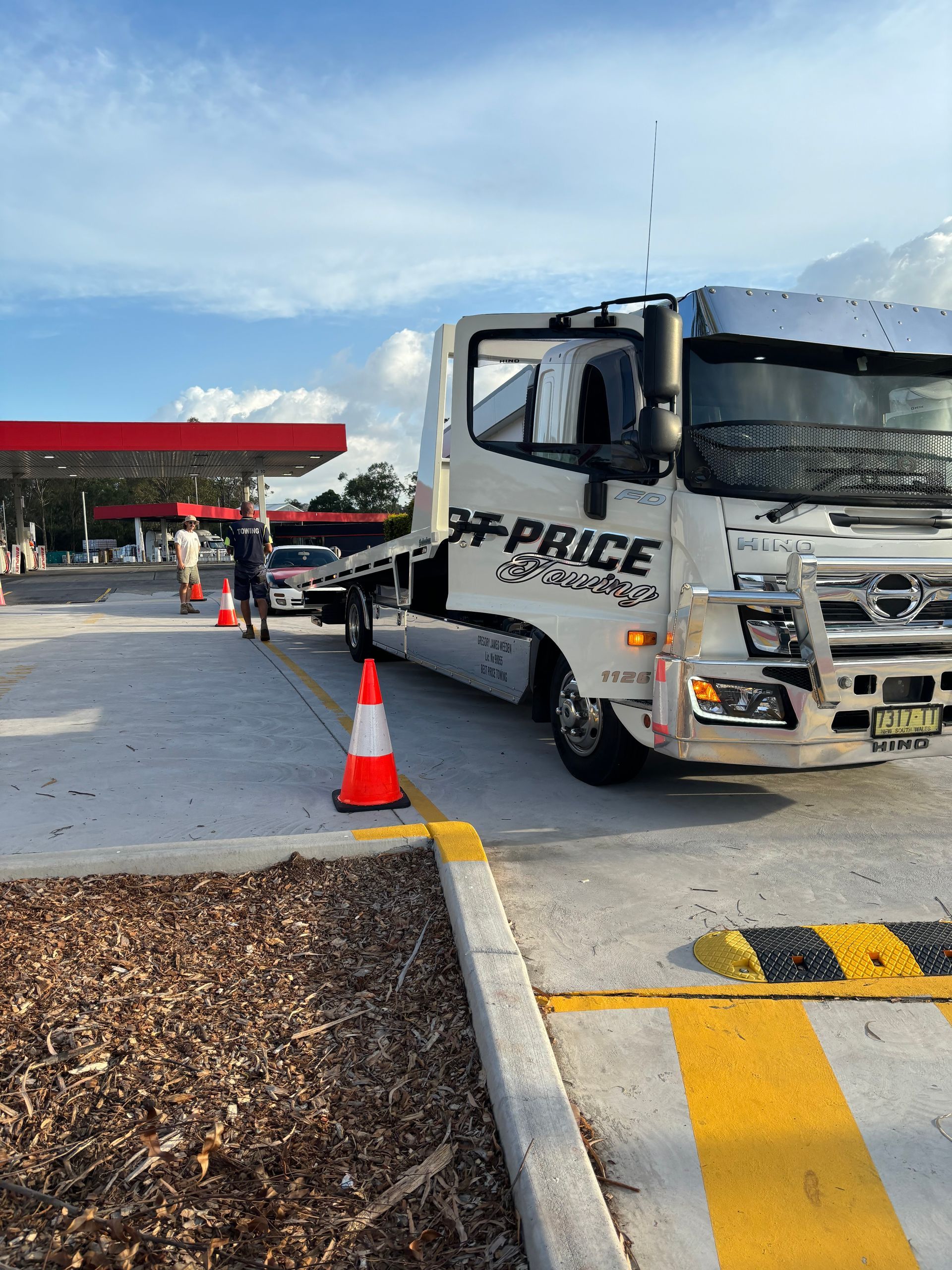Tow Truck at Gas Station, Loading a Vehicle — Best Price Towing in Cessnock, NSW
