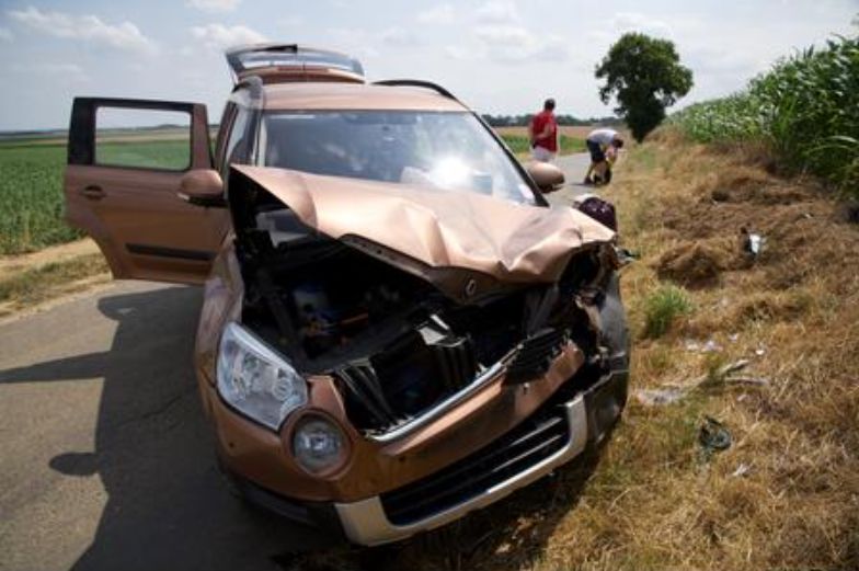 Damaged Brown Car on Side of Road After Crash — Best Price Towing in Lake Haven, NSW