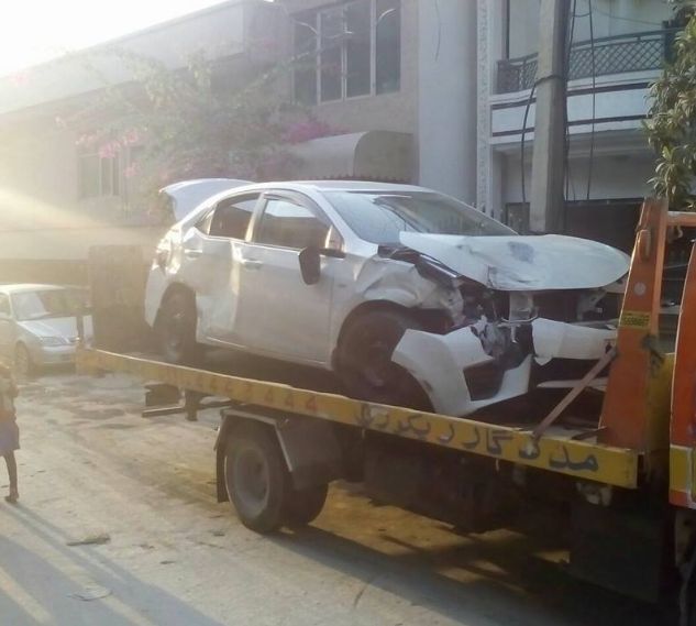 White Car on a Yellow Tow Truck, Parked on a Street — Best Price Towing in Woongarrah, NSW