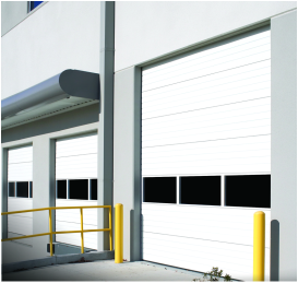 A white garage door with black squares on it