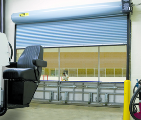 A roller shutter with a chair in front of it