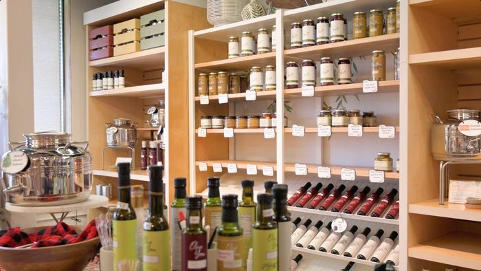 A store filled with lots of bottles and jars of food.