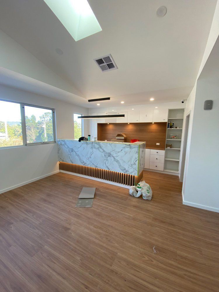 There Is A Marble Counter Top In The Middle Of The Room — L.A.F Electrical P/L In Umina, NSW