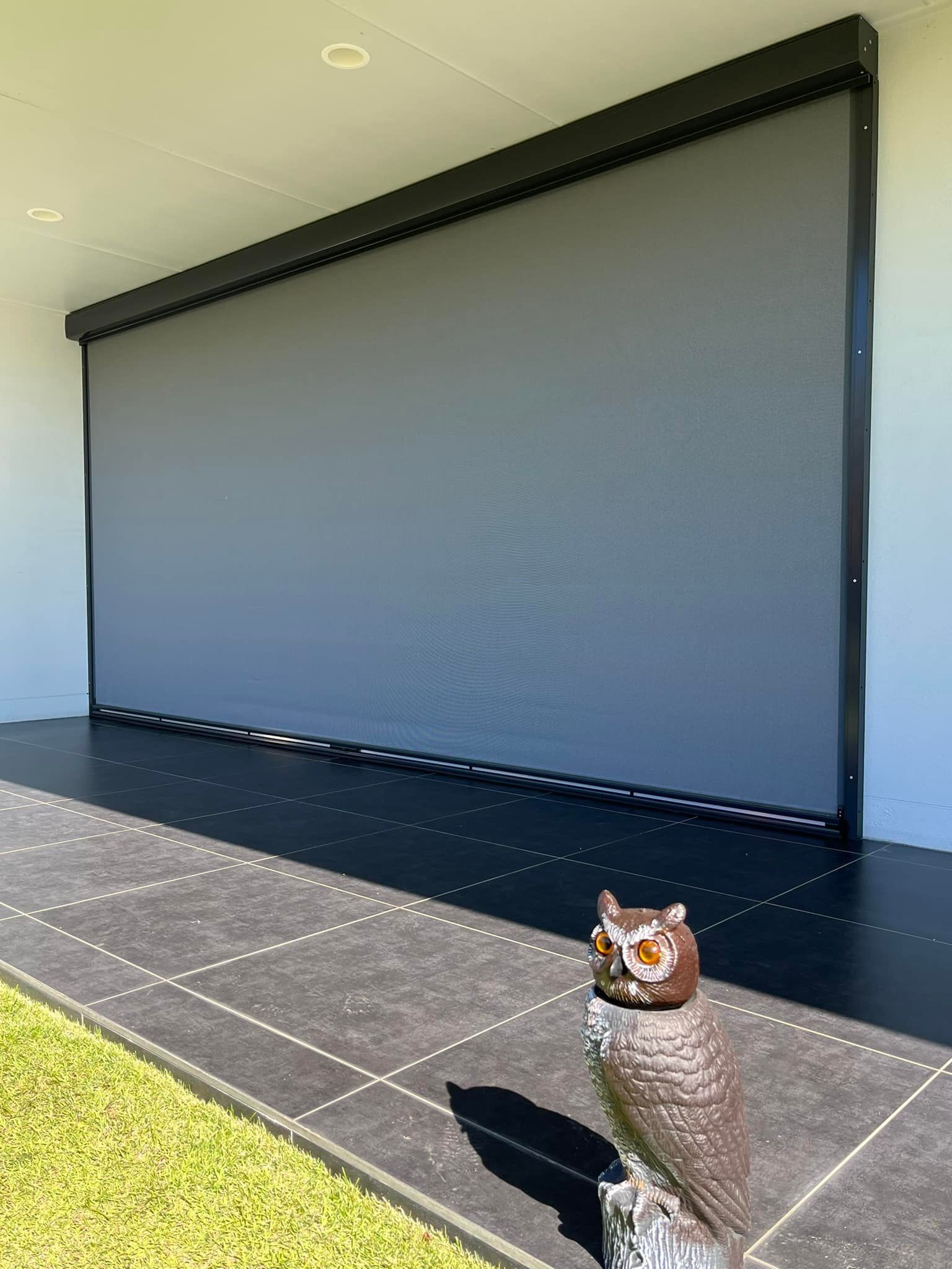 A Dining Room With a Table and Chairs and a Kitchen — Whitsunday Blinds & Security In Beaconsfield, QLD