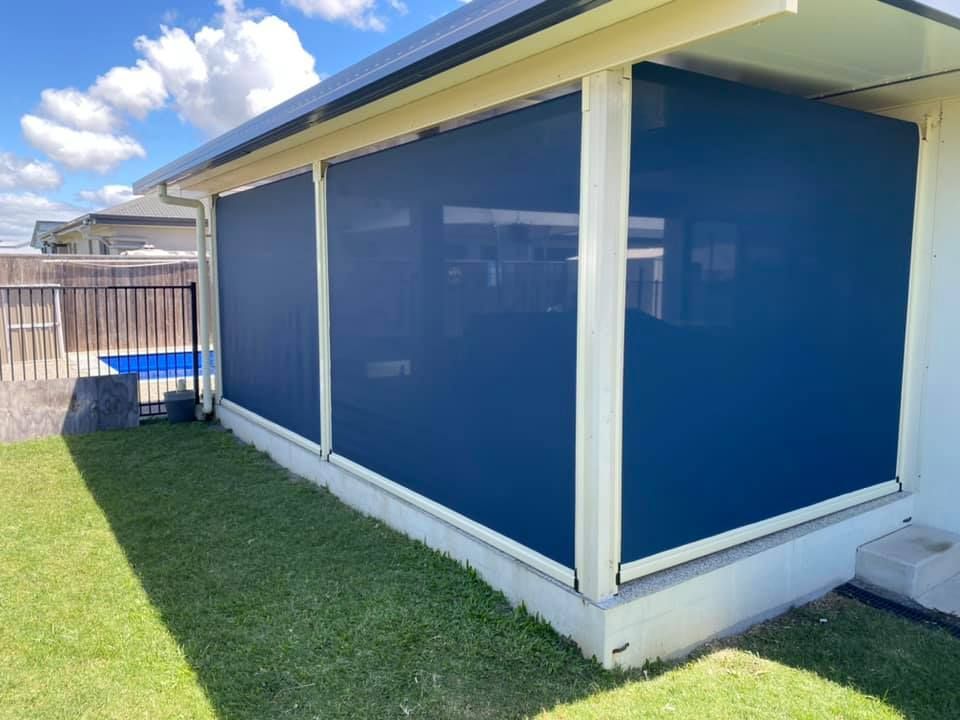 A House With Blue Blinds on the Side — Whitsunday Blinds & Security In Beaconsfield, QLD